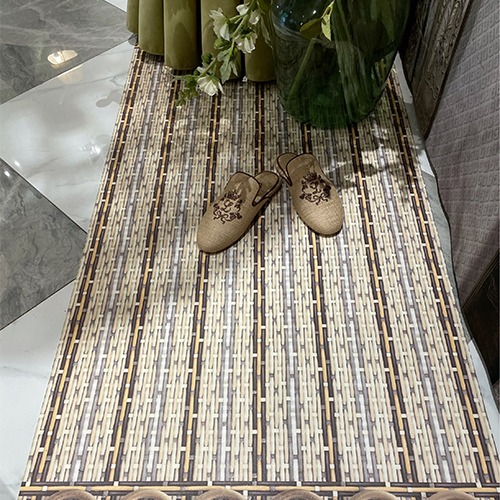 Natural braided vinyl rug by Philippe Model